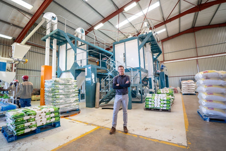 Josua Pietersen standing in front of his Roff R-70 Maize Mill